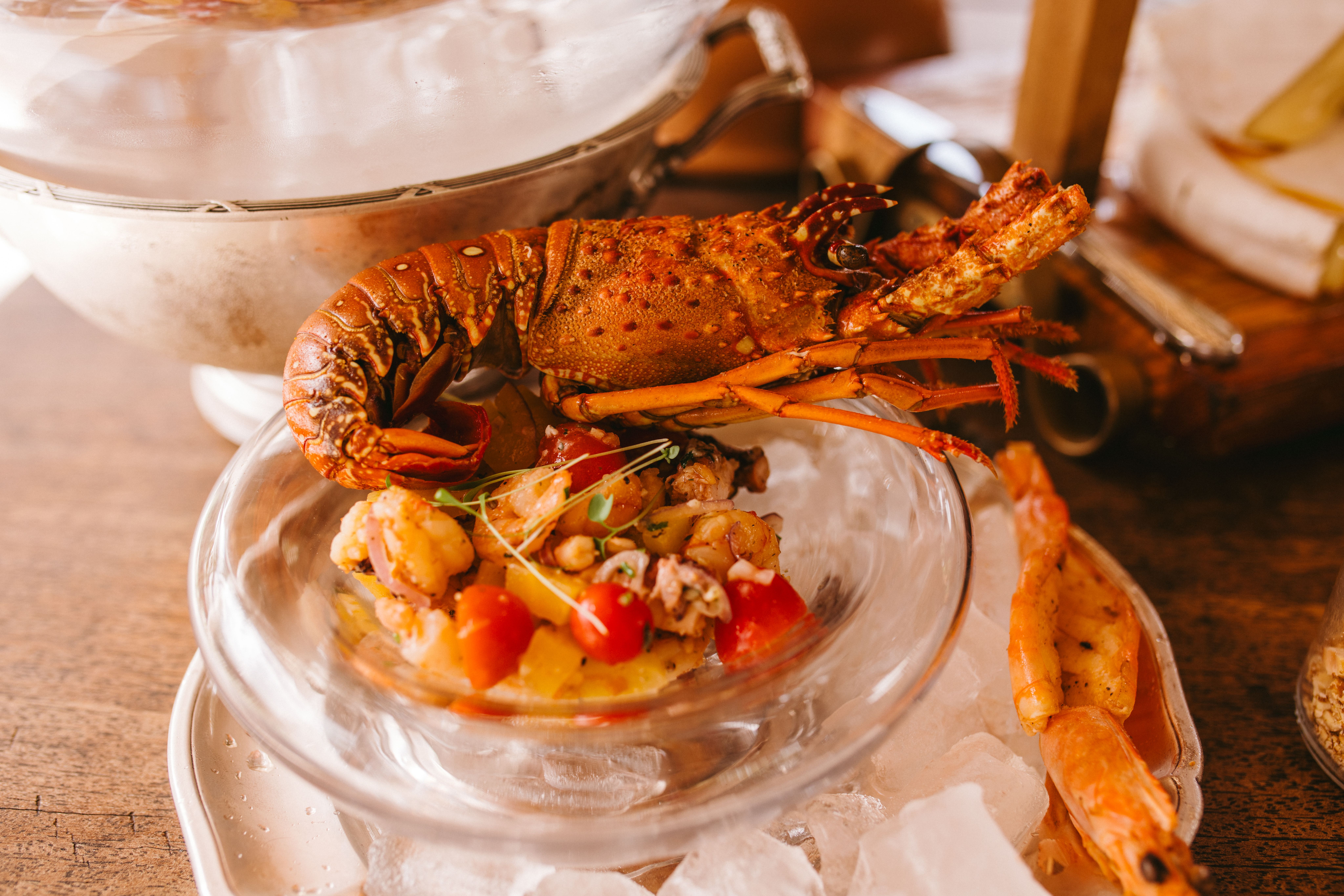 Delicious seafood platter with lobster and shrimp presented in an elegant setting.