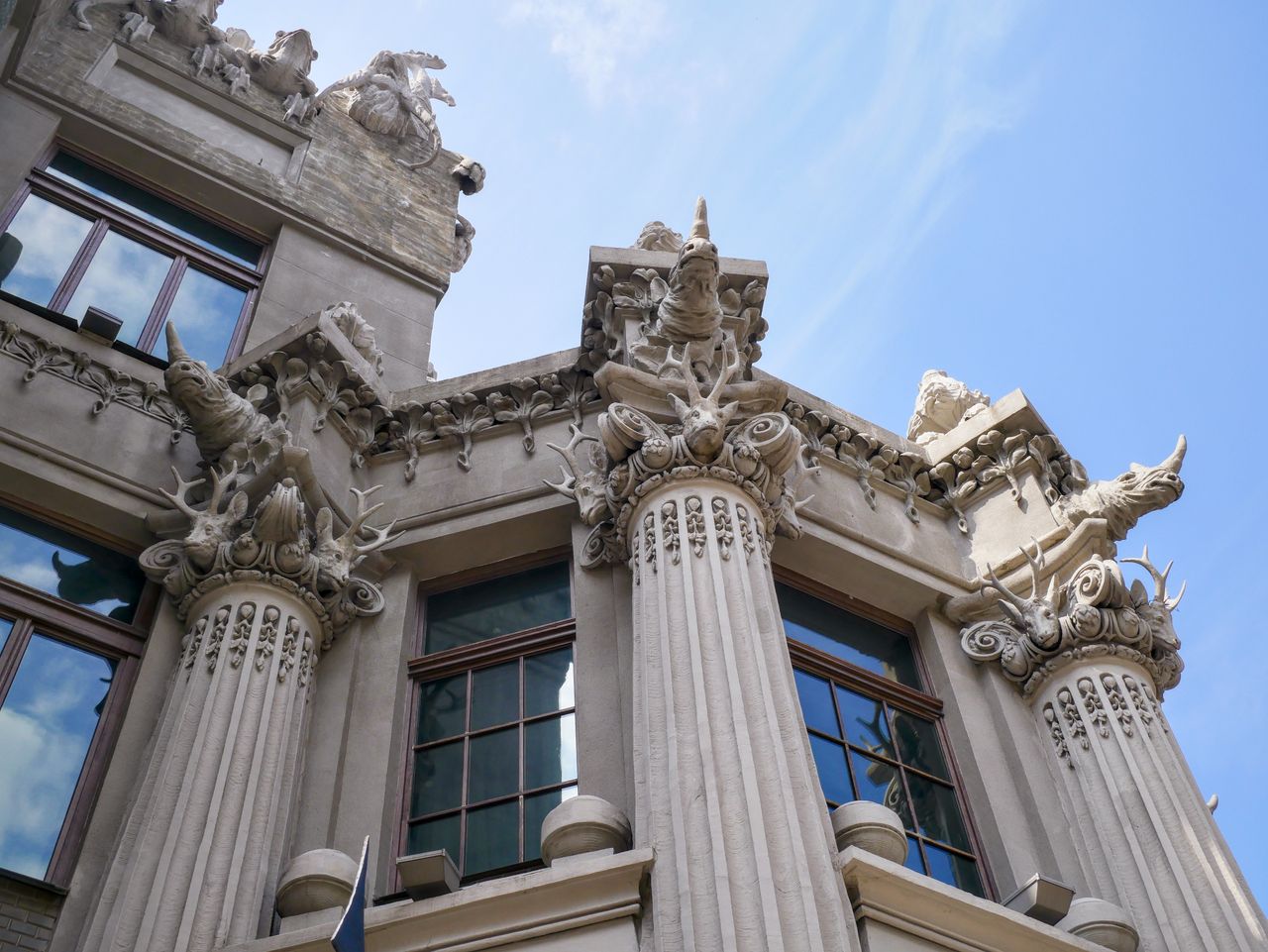 close up view of intricate architectural details and sculptures on a h