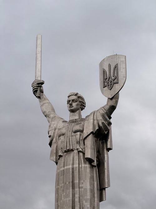 Free The iconic Motherland Monument in Kyiv stands tall under a cloudy sky, symbolizing strength and resilience. Stock Photo