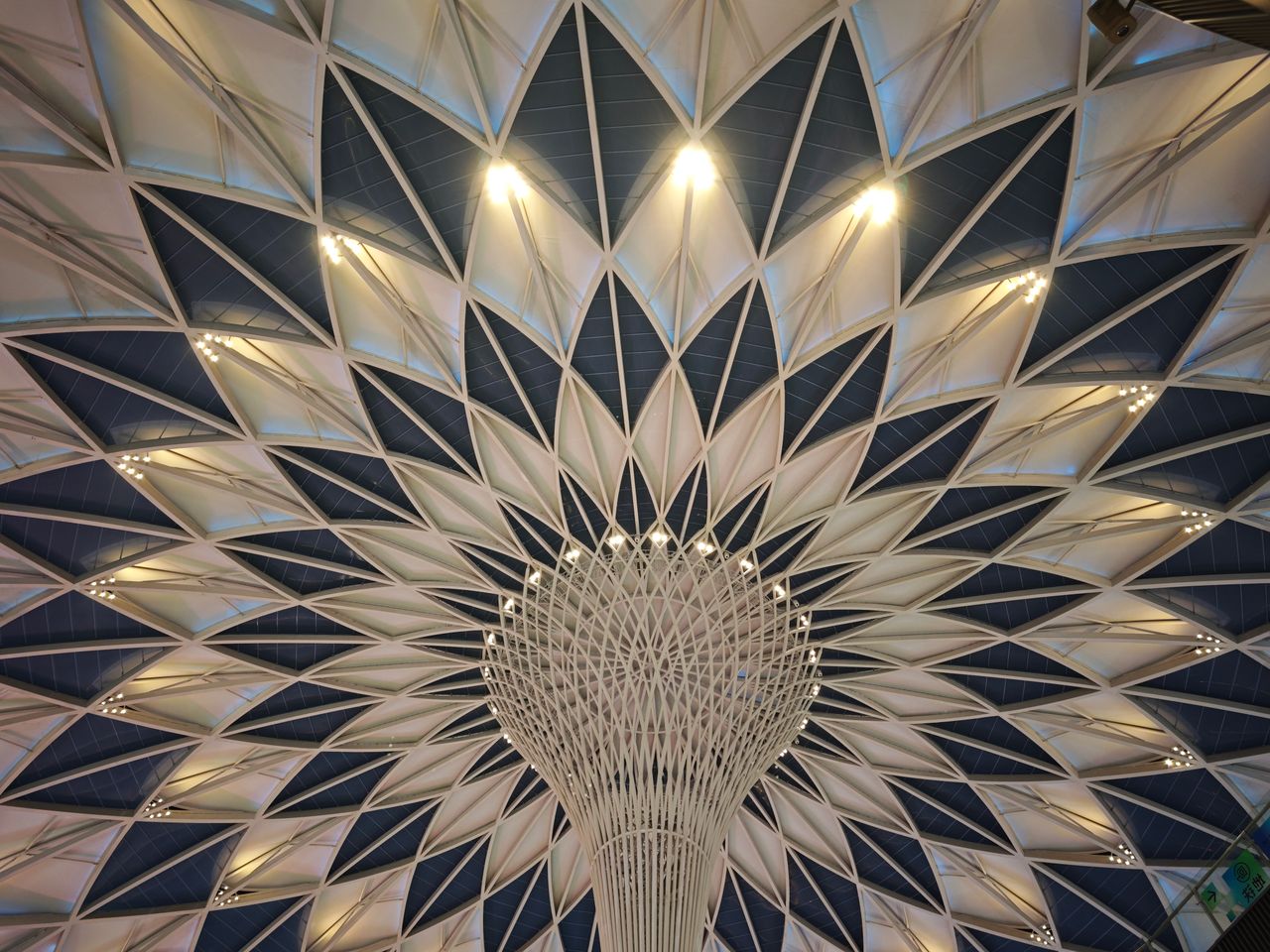 a stunning view of a geometric dome ceiling showcasing intricate archi