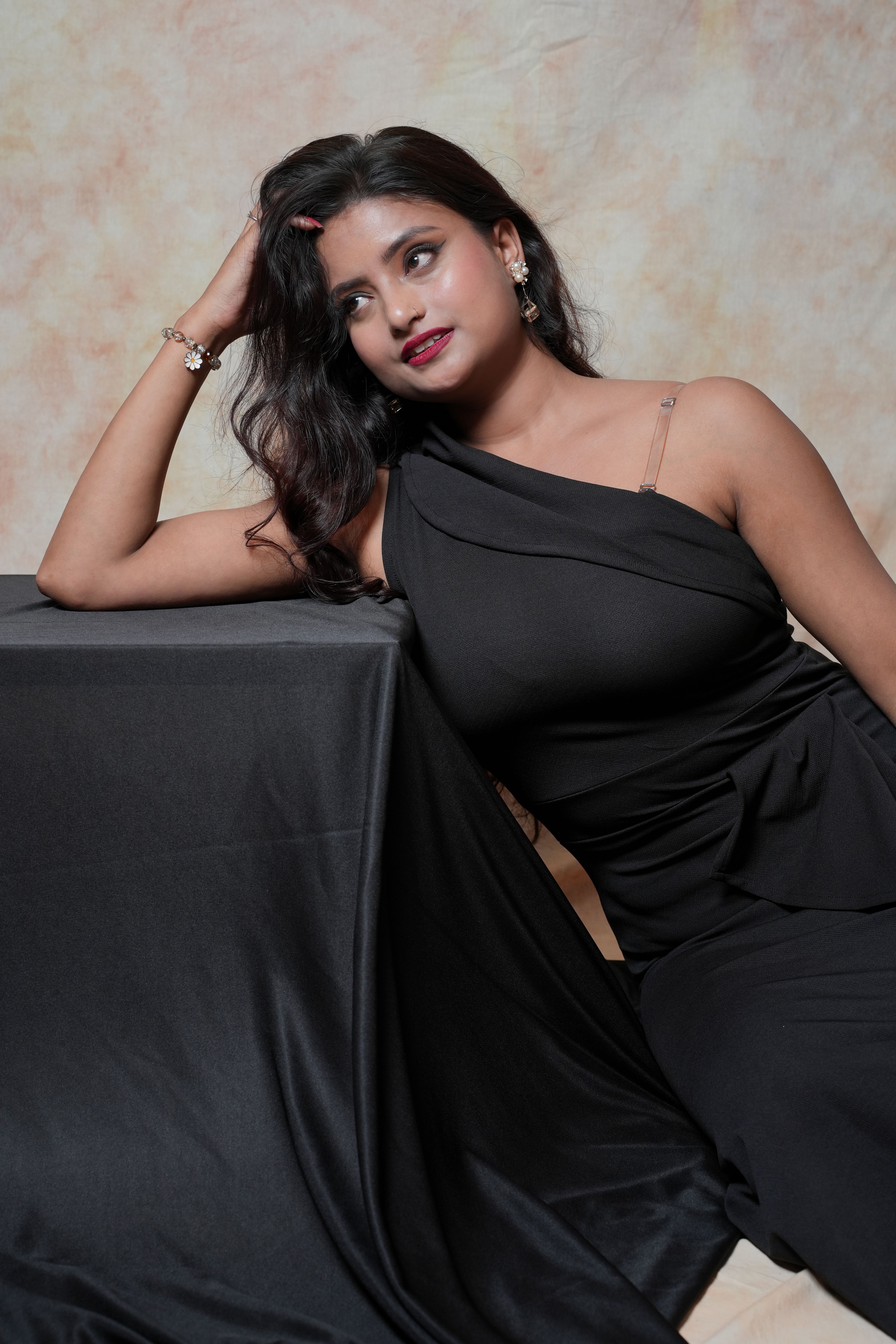 Elegant Woman in Black Dress Posing Indoors · Free Stock Photo