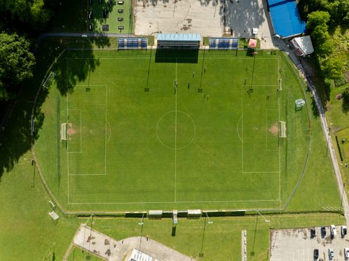 Free Aerial shot of a football field in Garešnica, Croatia on a sunny day. Stock Photo