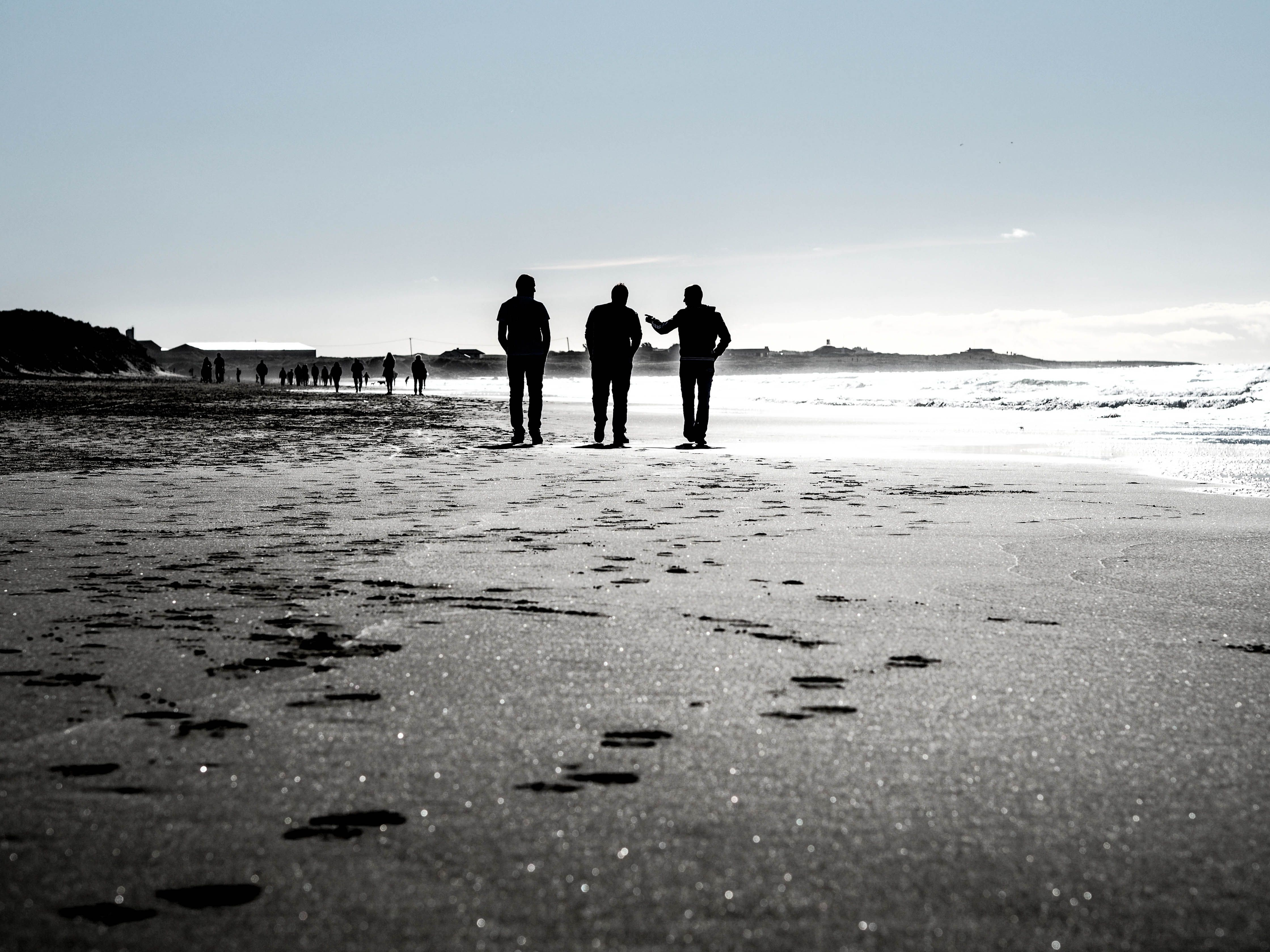 Search team combing the beach for clues