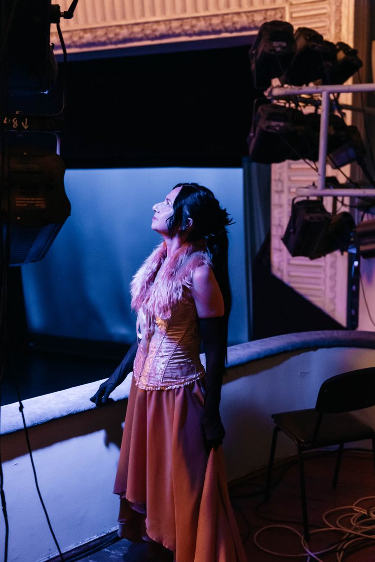 A costumed performer waiting in the wings before a show — photo by Olga Solo on Pexels