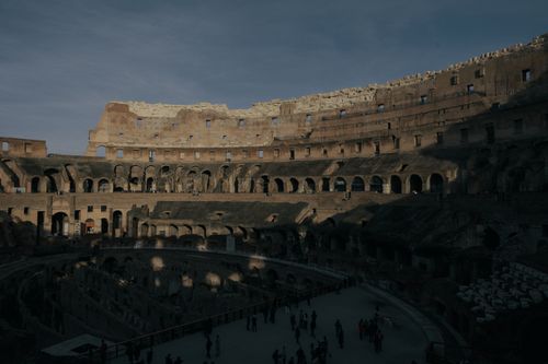 Free Interior view of the Colosseum in Rome, Italy, under subtle evening light. Stock Photo