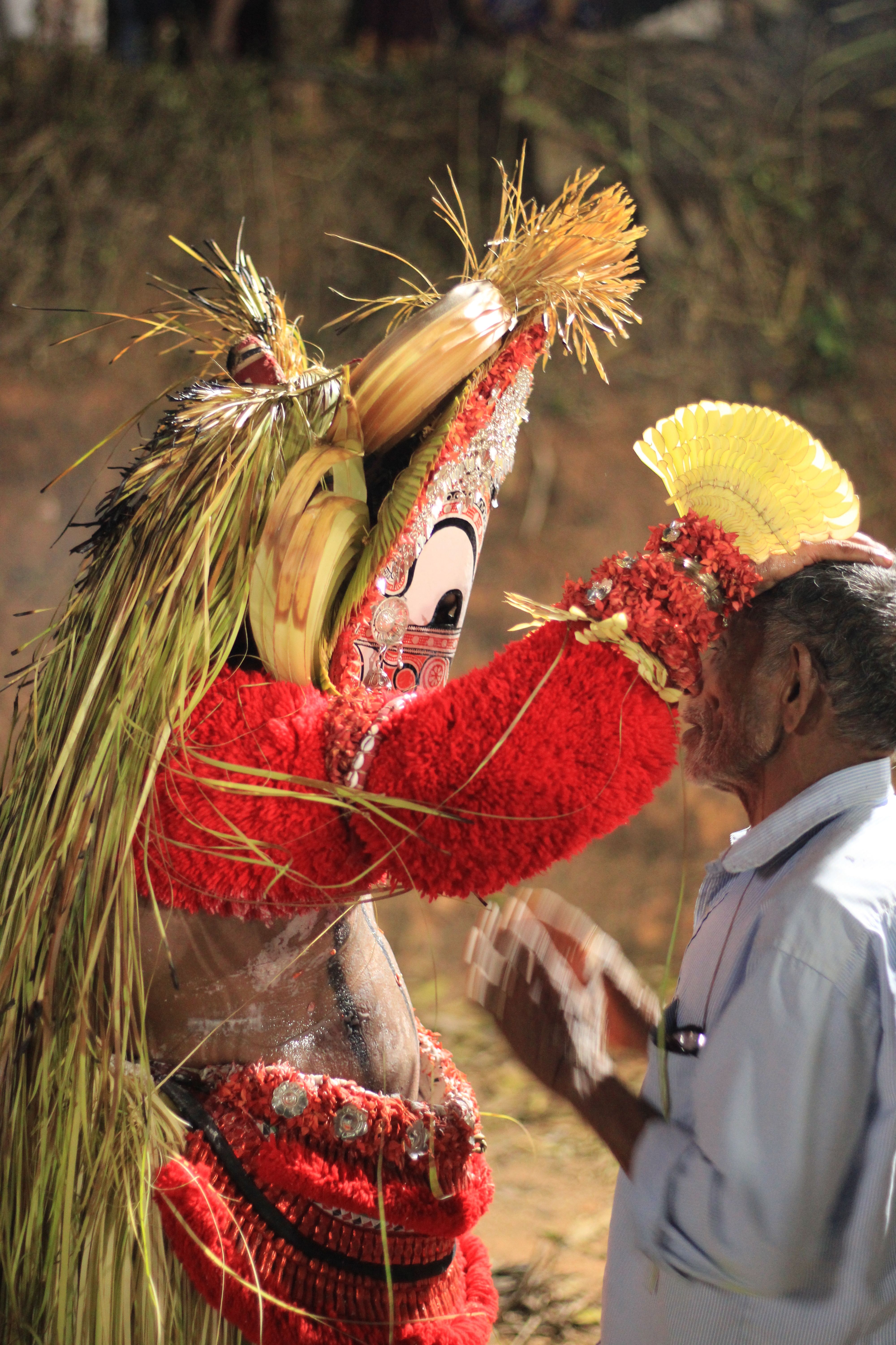 Captivating Theyyam performance, showcasing traditional Kerala art and culture.