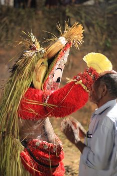 Captivating Theyyam performance, showcasing traditional Kerala art and culture.