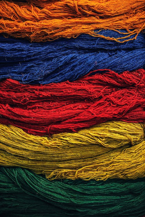 Free Close-Up Shot of Threads with Assorted Colors Stock Photo