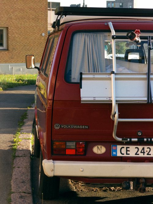 Free A vintage red Volkswagen van parked on a street in Oslo, Norway, during the day. Stock Photo