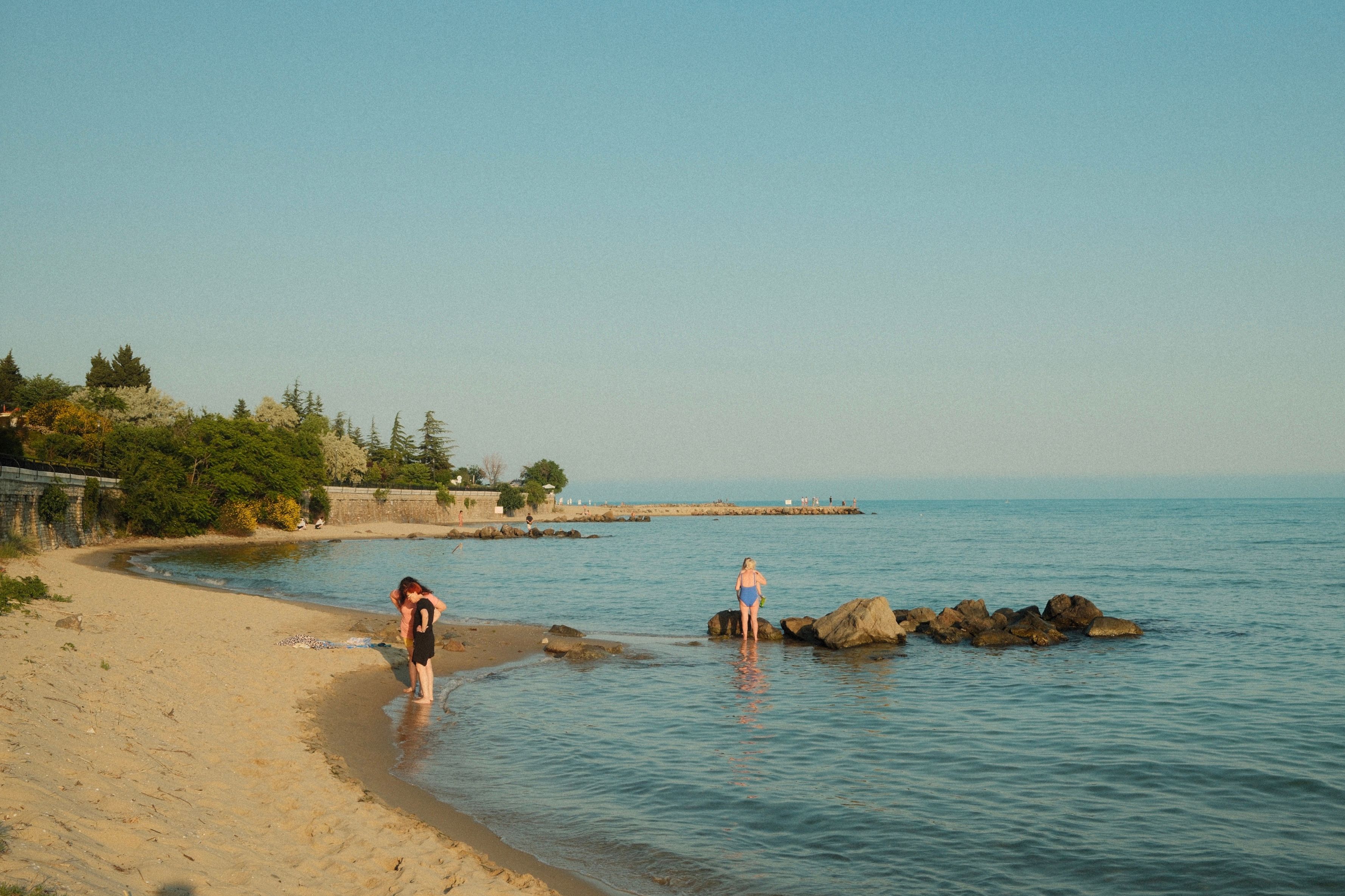 People swimming in the refreshing waters of Lake Sevan, Armenia, in summer