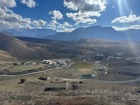 A breathtaking panoramic view from Marango Rangarik, India, showcasing the rugged mountains and expansive sky.
