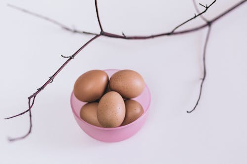 Eggs on Pink Plastic Bowl