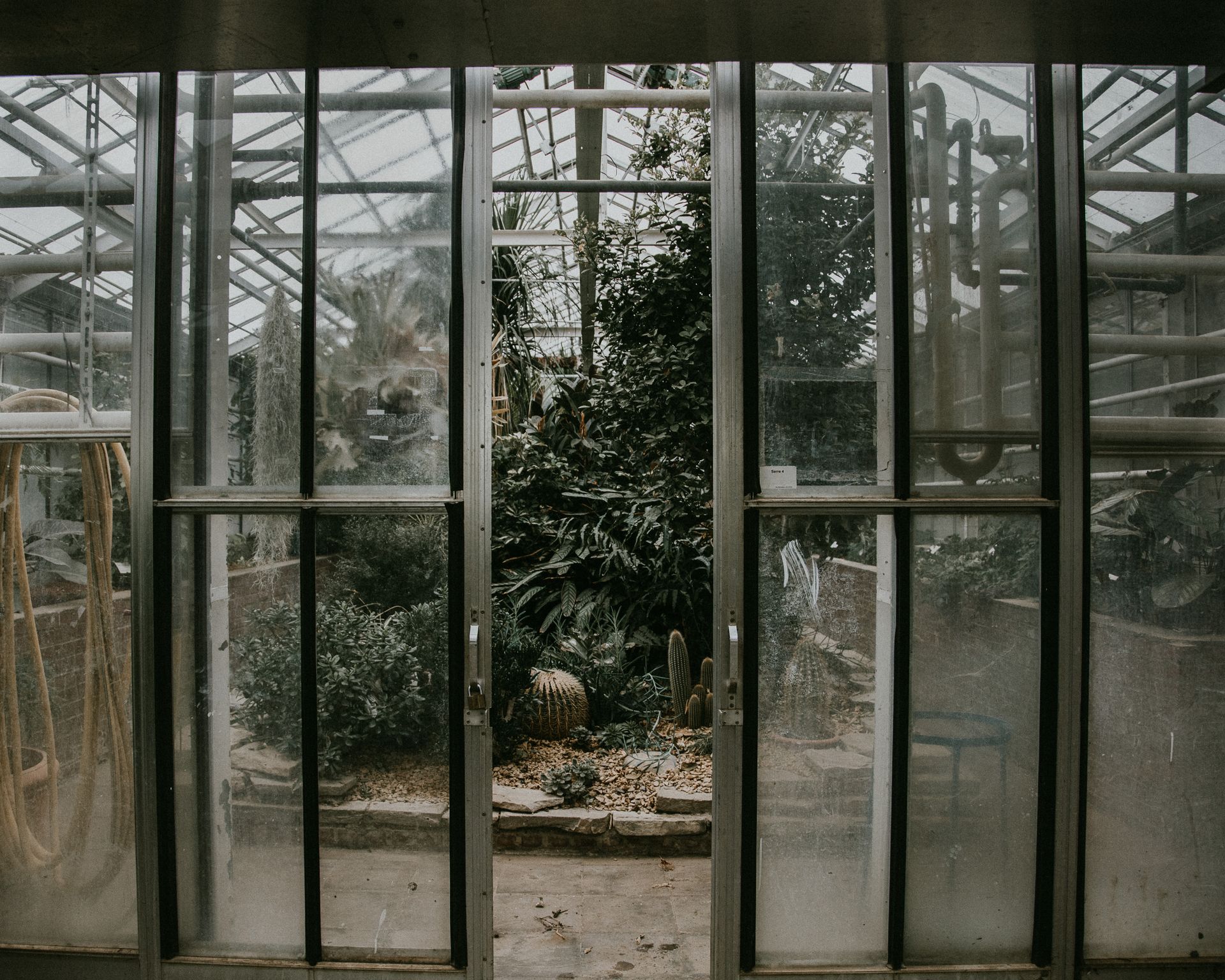 A Glass Door in a Greenhouse