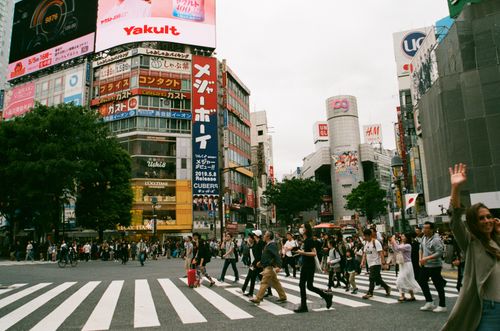 Free A vibrant scene of people crossing the famous Shibuya Intersection in Tokyo, Japan, capturing urban life. Stock Photo
