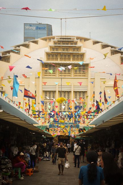 Colorful scene at the entrance of Central Market (Psar Thmei) in Phnom Penh, Cambodia.