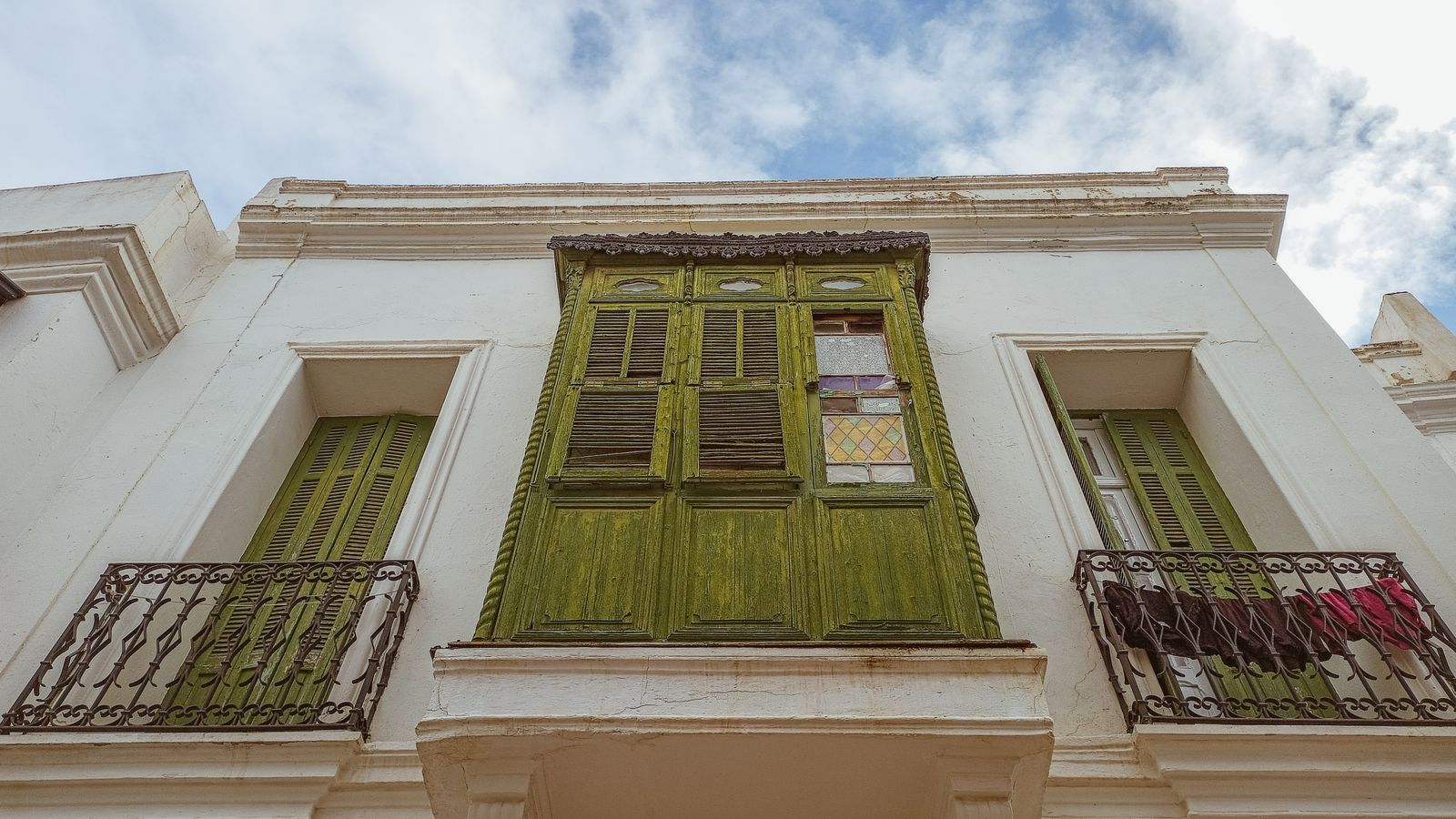 Traditional tunisian architecture with green shutters