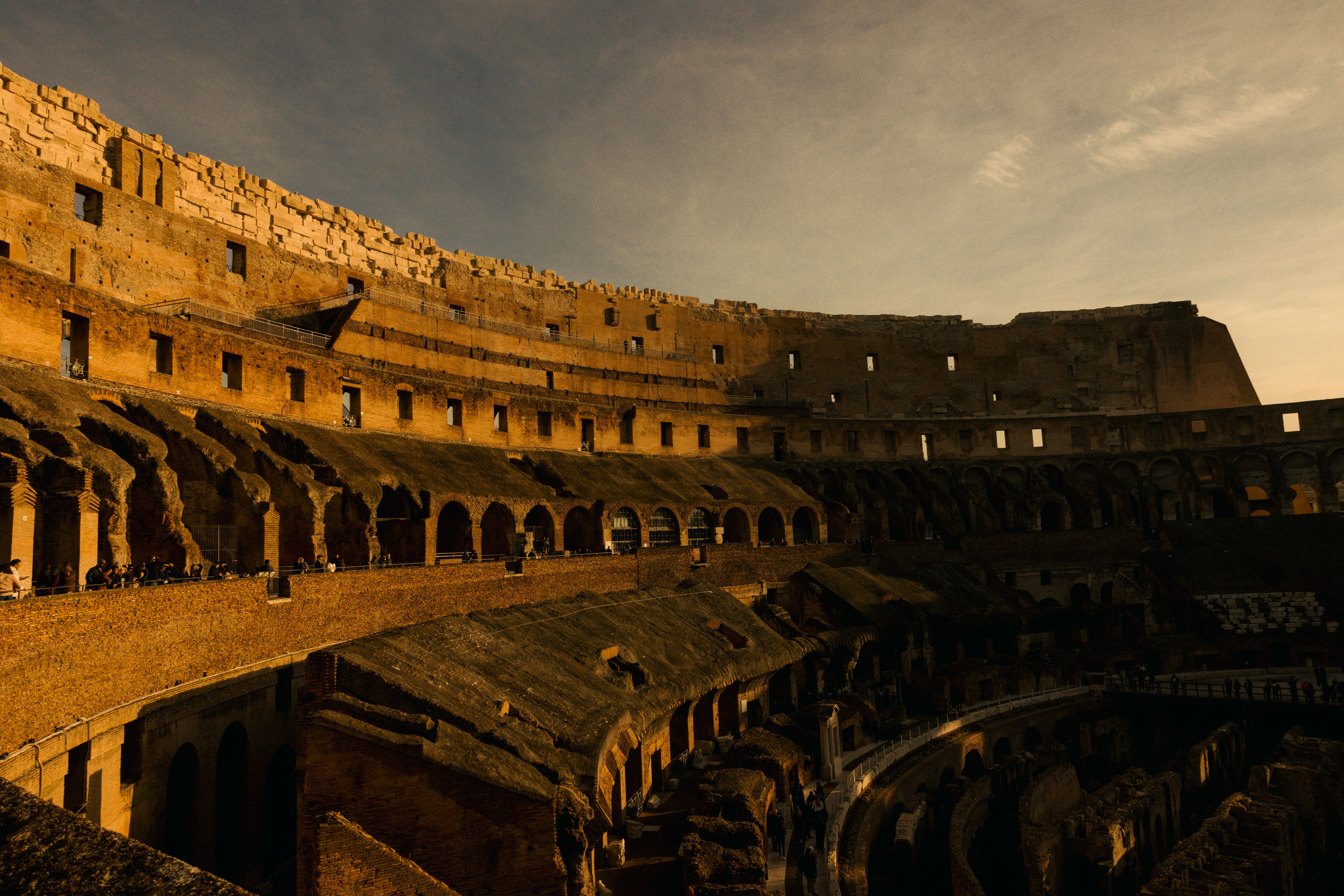 Roma supporters viewing a new signing presentation beneath stadium lights during the 2026 summer window