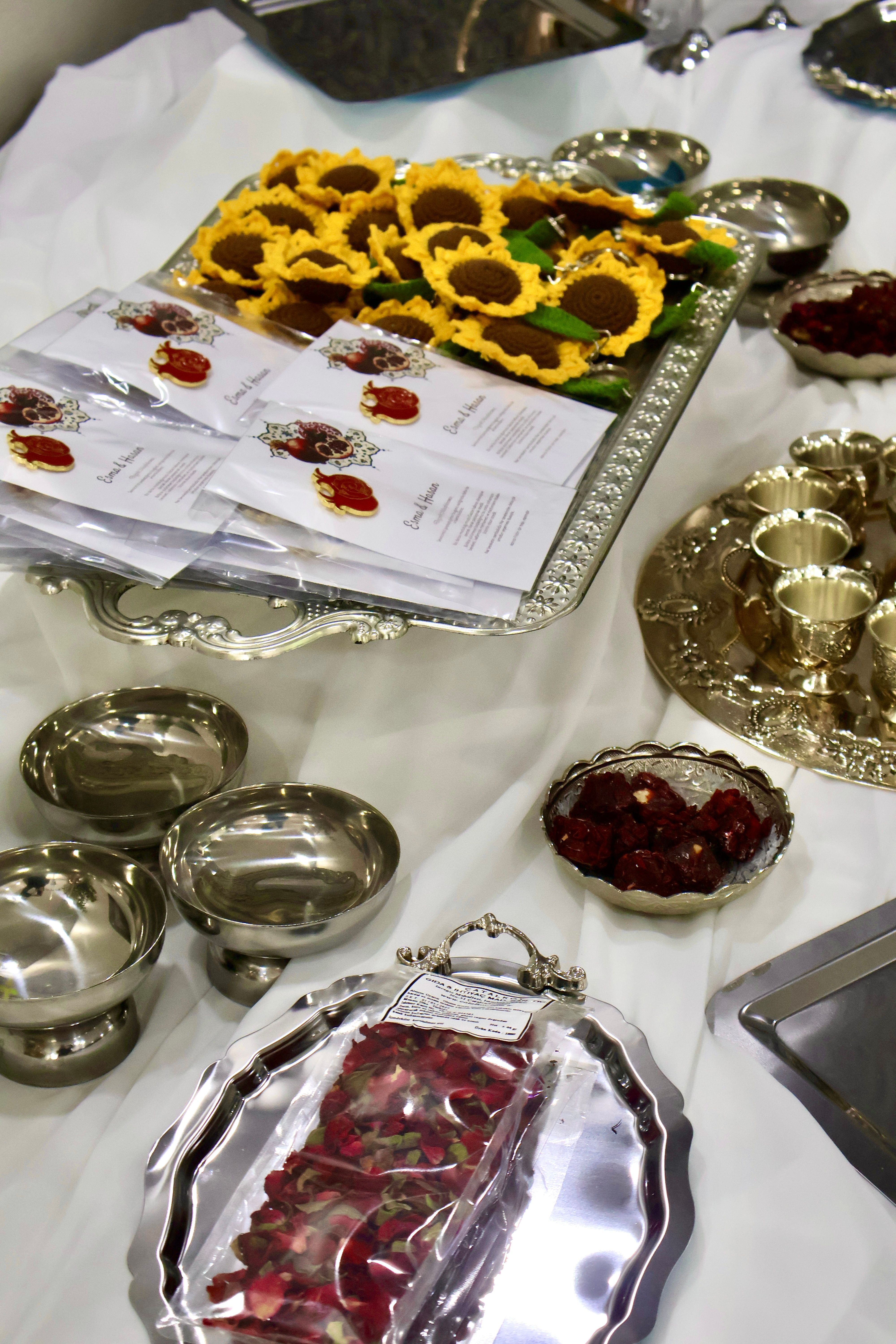 Indian sweets on a silver table setting