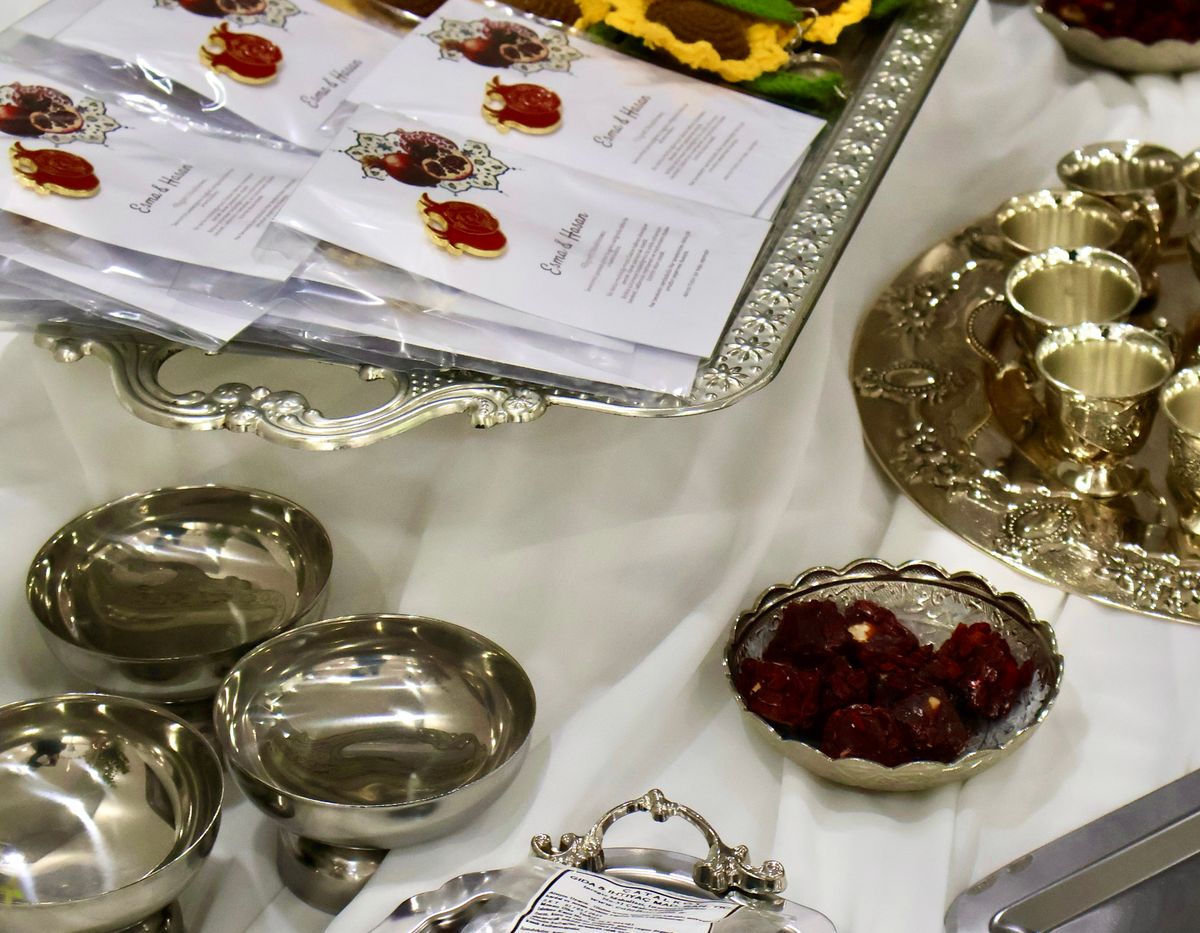 Traditional Indian sweets on a silver table setting