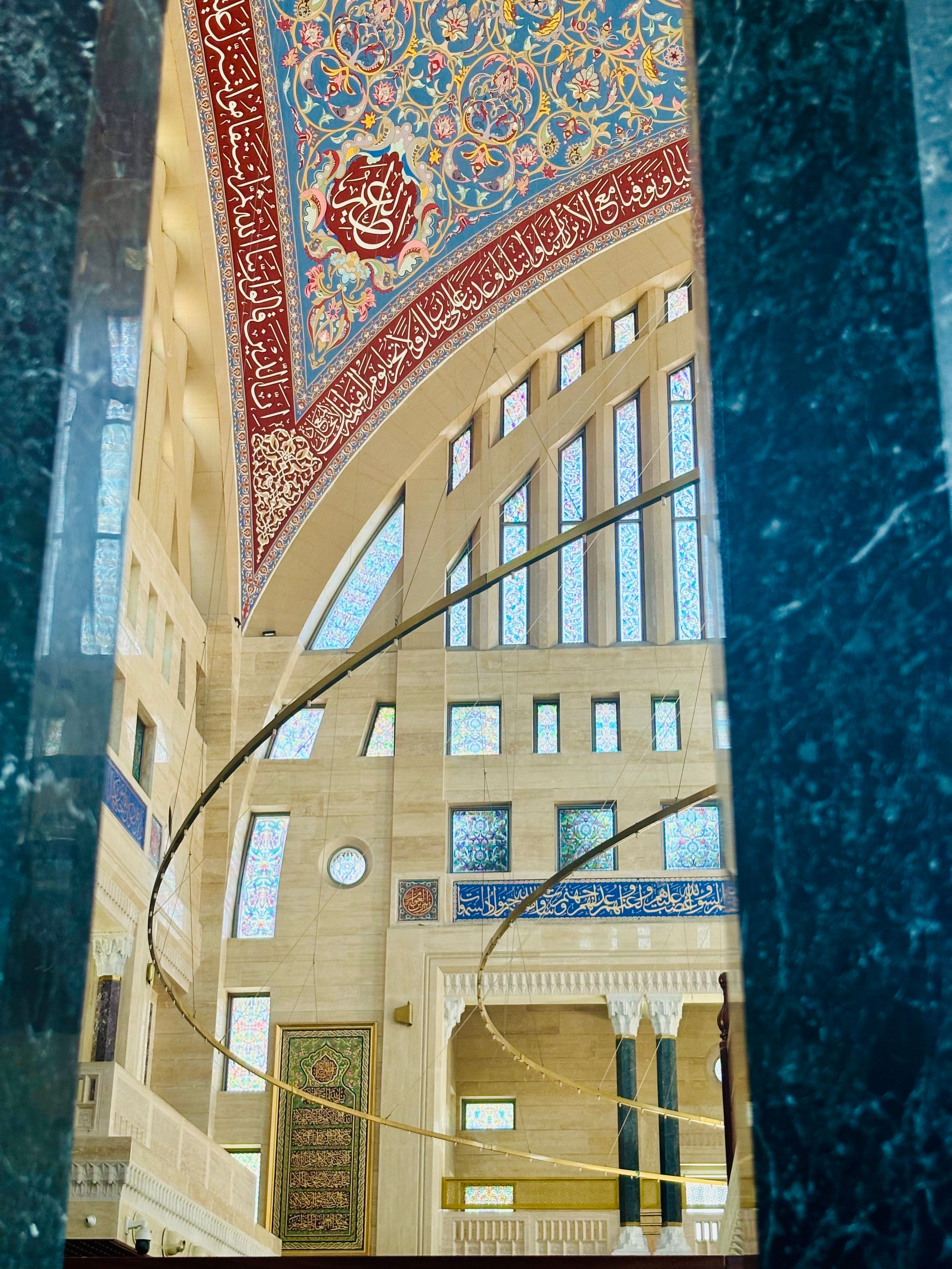 [ColoSach]-explore-the-breathtaking-architecture-of-a-mosque-with-vibrant-stained-glass-and-detailed-calligraphy.