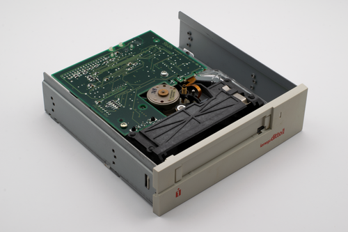 Free A close-up of a vintage Iomega Ditto internal floppy drive, illustrating retro technology. Stock Photo