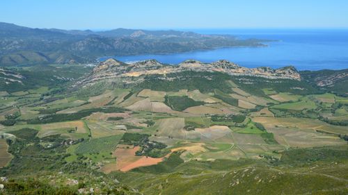 Free Aerial photograph of a lush Mediterranean landscape with coastline. Stock Photo