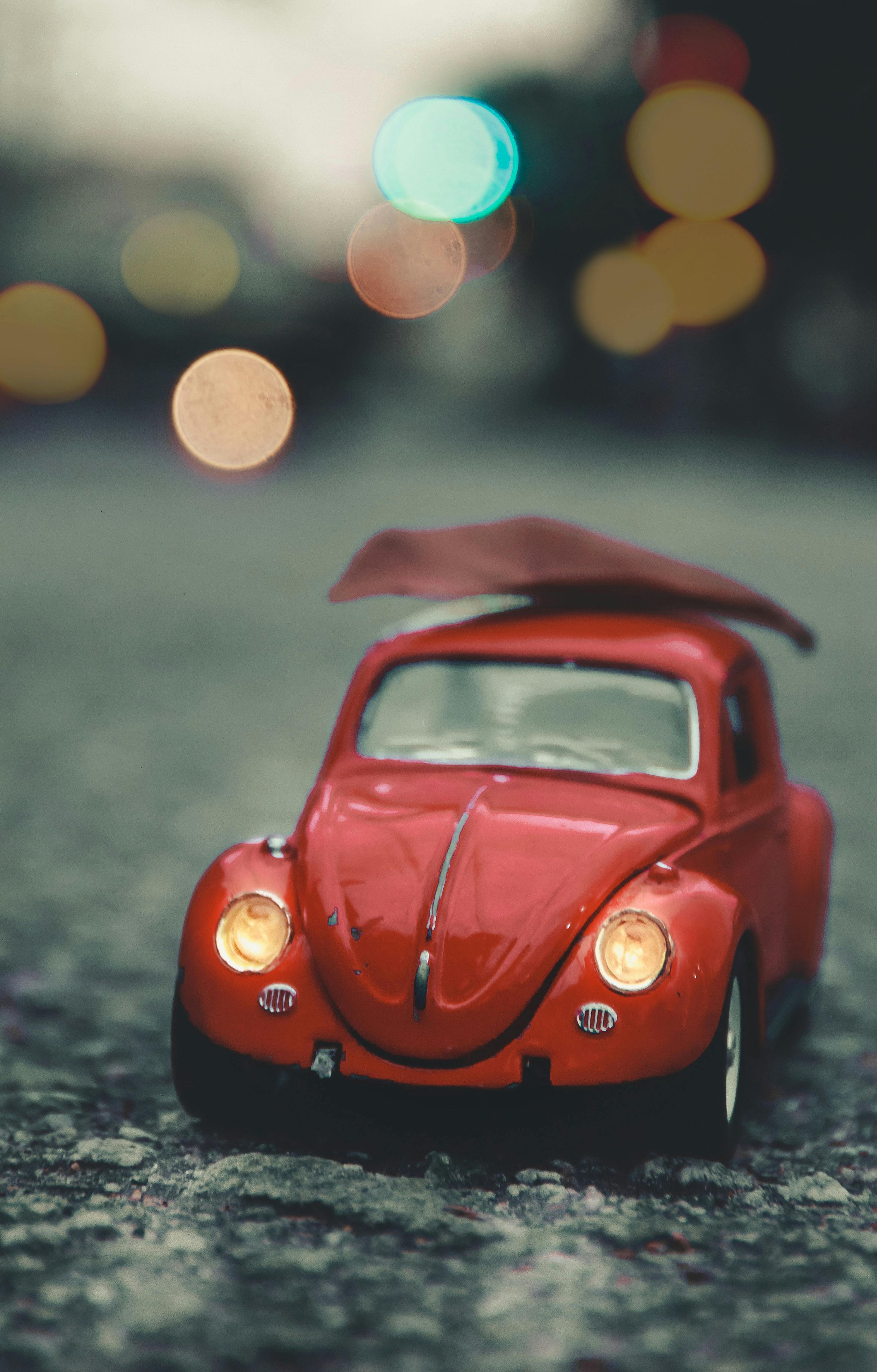 Wallpaper Red Volkswagen Beetle on Road During Daytime Background   Download Free Image