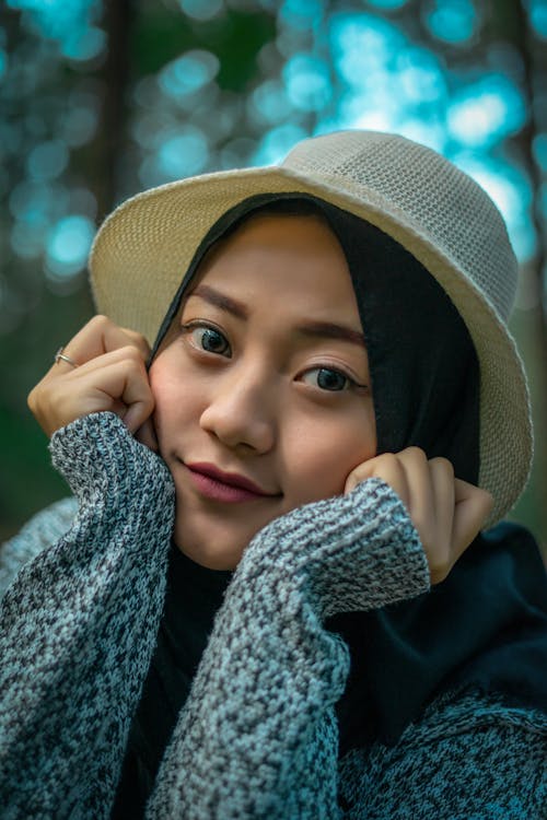 Woman in Black Hijab and Gray Sweater