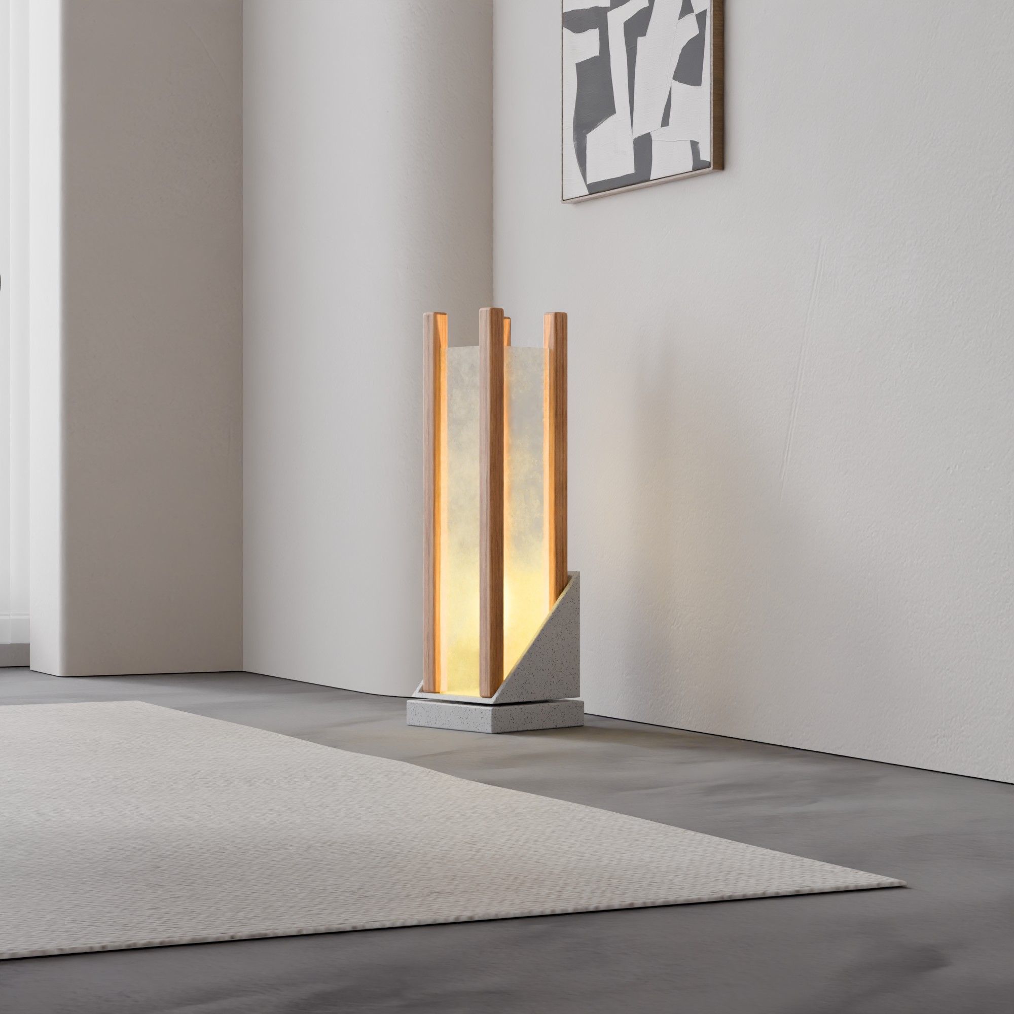 A modern minimalist interior featuring a stylish floor lamp and contemporary wall art, emphasizing elegant simplicity.