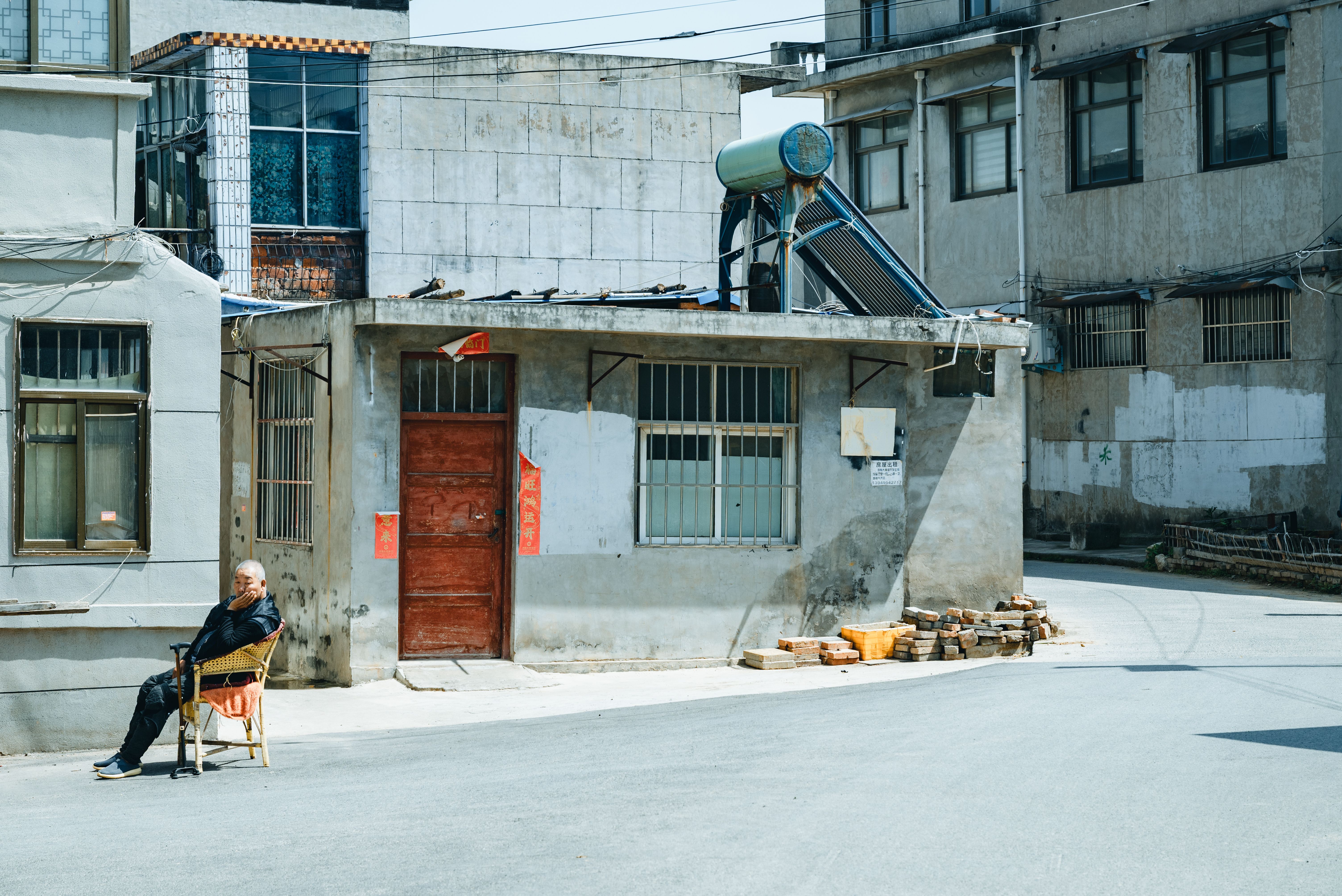 Constantine — professional movers carrying furniture on a house move
