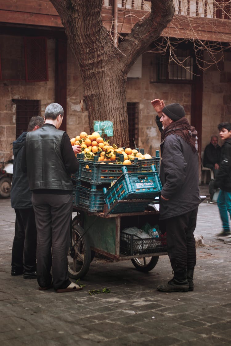 Old Man Selling Fruits On Street