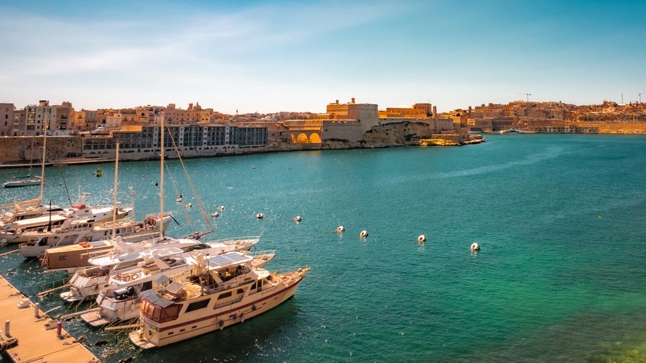 Stunning 2-Day Introduction to Sail Cruising Course in Malta Review: Your Complete Guide to Learning the Ropes Review 2026 - Peaceful marina scene with boats, historic buildings, and vibrant blue waters under a clear sky.