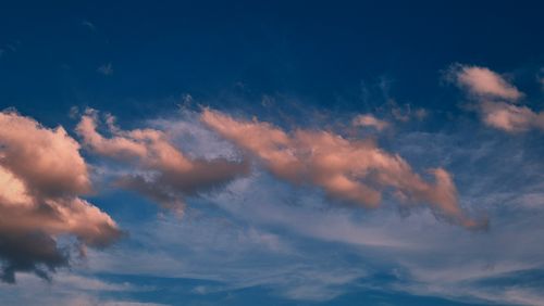 Free Soft orange clouds at twilight in Gia Lai, Vietnam, creating a serene sky scene. Stock Photo