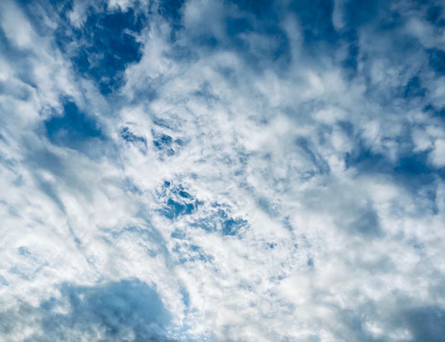 Broken cloud over open sky — photo by Marianna Sigov on Pexels