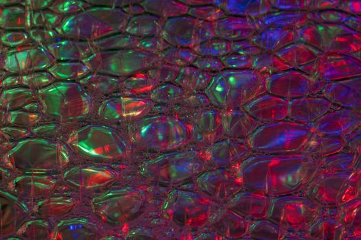Vibrant abstract design with colorful bubbles and reflections.