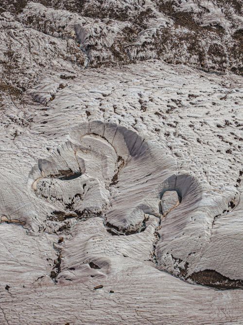 Free Stunning aerial photo of a snow-covered glacier in Zermatt, Switzerland. Stock Photo