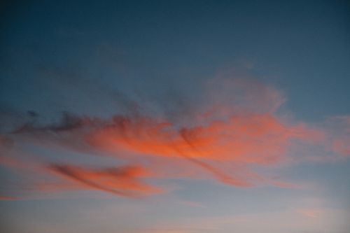 Free Bright red clouds against a deep blue sky during sunset in Connecticut, USA. Stock Photo