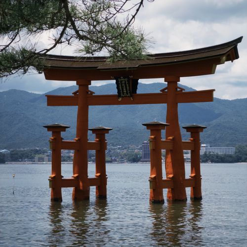 Free Stunning view of the iconic floating Torii Gate at Itsukushima Shrine. Stock Photo