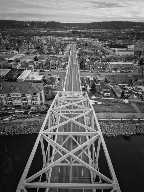 Free Black and white aerial view of Wabasha, Minnesota showing a bridge and townscape. Stock Photo