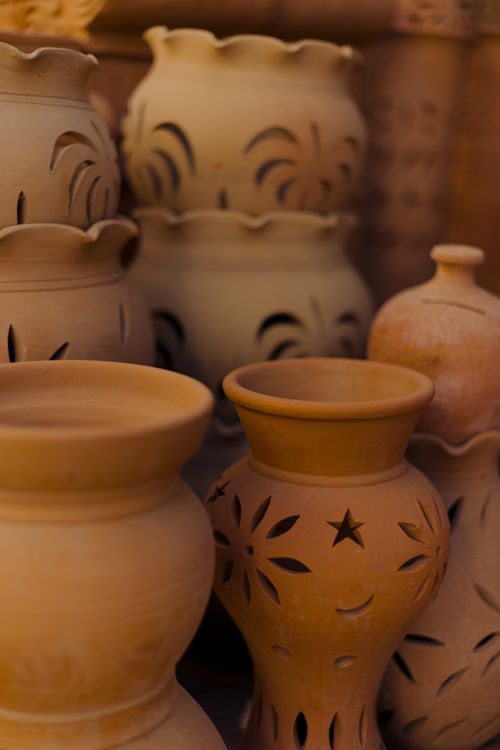 Free Beautiful traditional terracotta pottery displayed in a Dubai market, highlighting intricate designs. Stock Photo