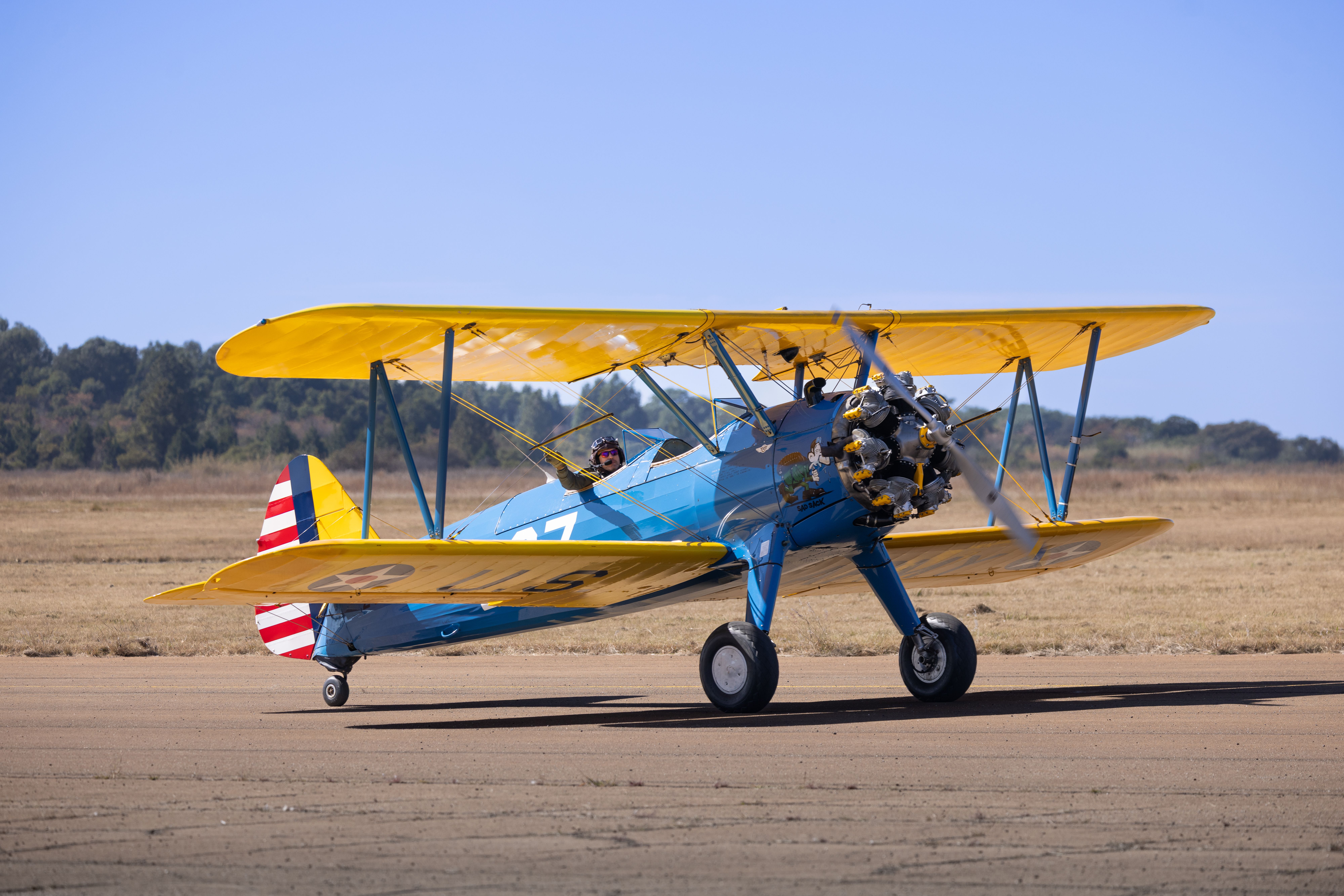 A Vintage Plane in an Airfield · Free Stock Photo