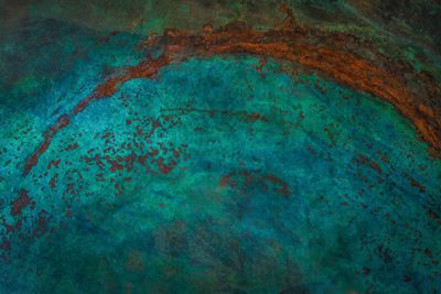 Weathered metal with turquoise patina — photo by Tim Mossholder on Pexels