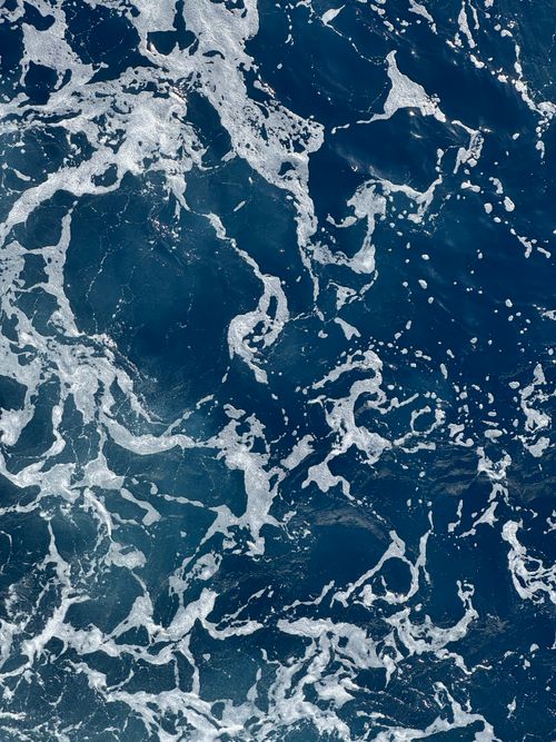 Free A captivating image of frothy ocean waves, showcasing nature's power near the Maltese coastline. Stock Photo