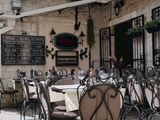 Outdoor bistro dining area — photo by Lena Netkach on Pexels