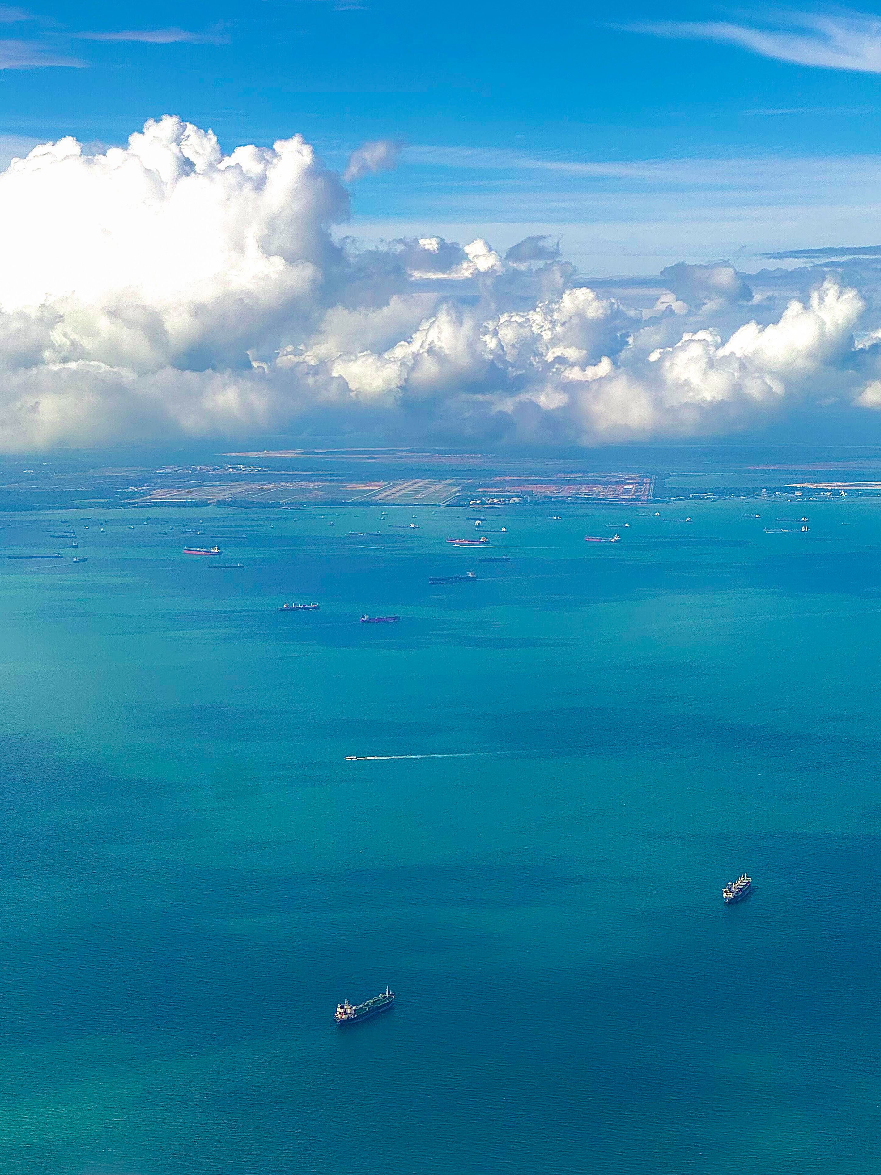 Aerial View of Cargo Ships in Blue Ocean Waters