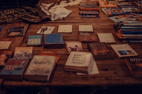 Free Collection of Books on Wooden Surface Stock Photo