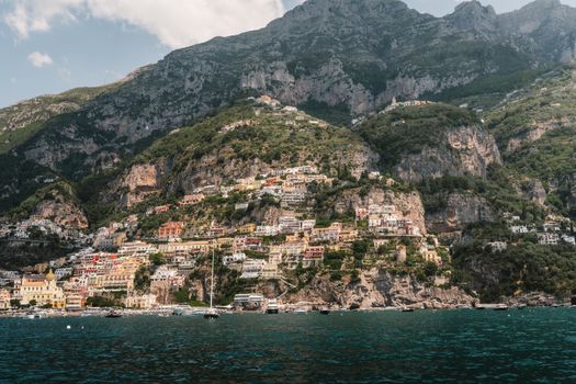Breathtaking view of Positano's colorful buildings on a rugged hillside along the Amalfi Coast.
