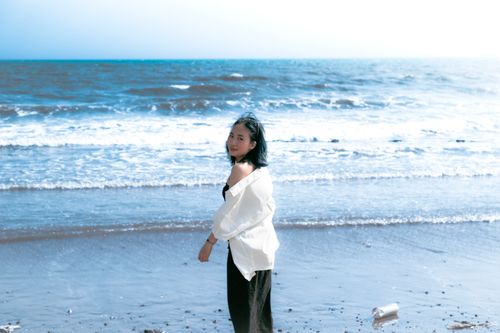 Free Youthful freedom at a sunny beach in Vietnam. Stock Photo