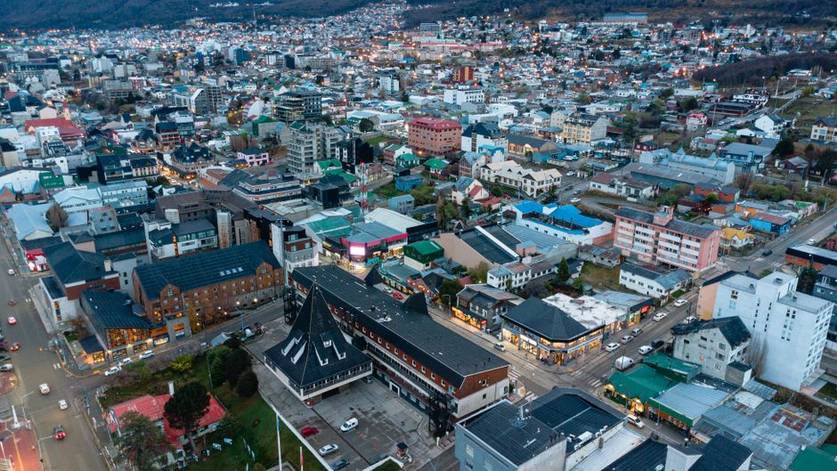 Stunning Helicopter Flyover in Buenos Aires Review: Soaring Over South America's Most Iconic City Review 2026 - Aerial photo of Ushuaia city showcasing diverse architecture at dusk.