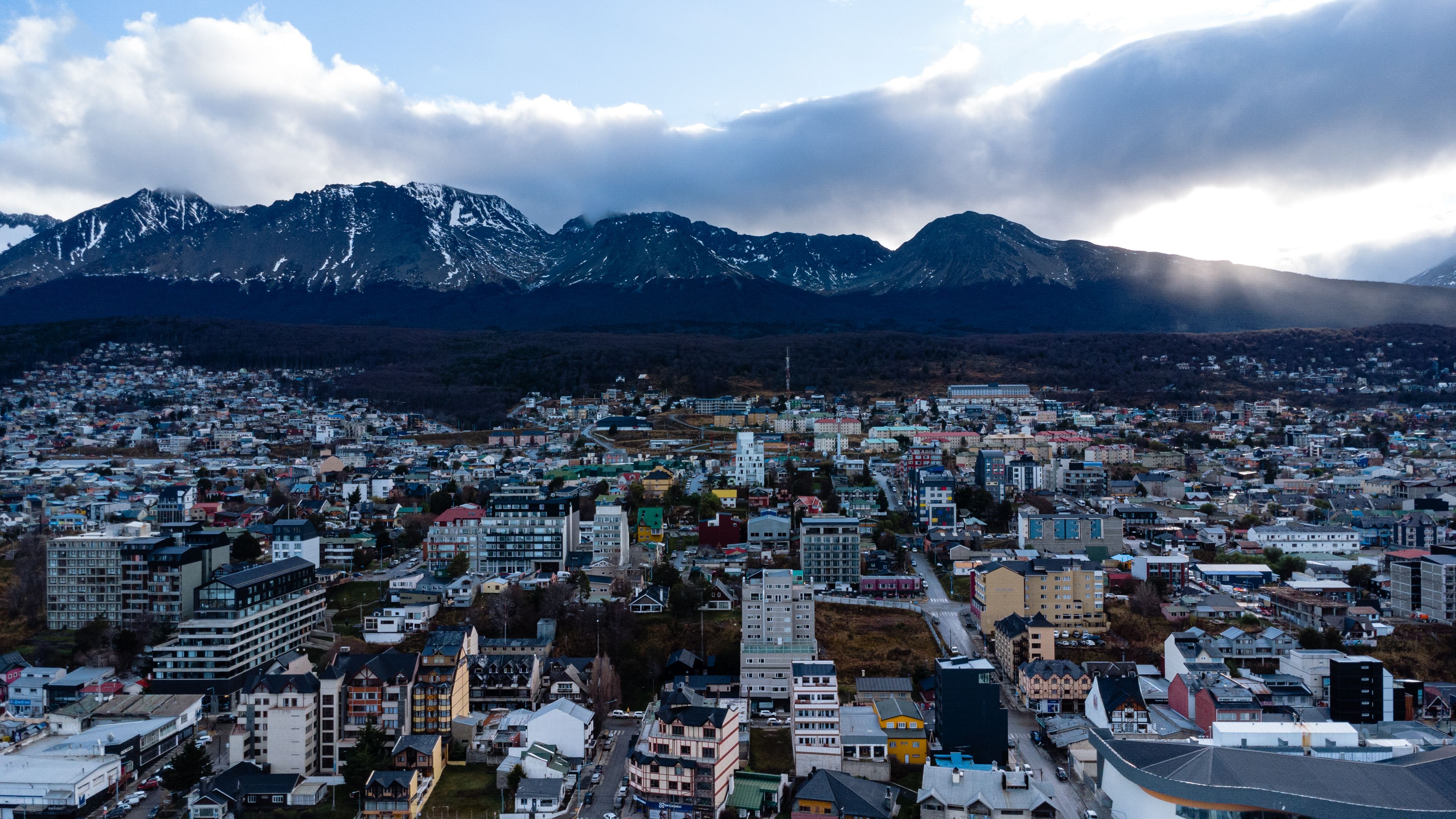 Amazing Private Tour to Iguassu Falls – Brazil & Argentina Highlights! Review 2026 - Explore the scenic cityscape of Ushuaia, Argentina, set against stunning mountains and dramatic skies.